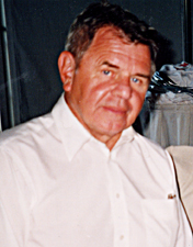 William Pollak in a white button-down short