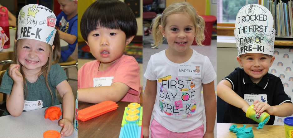 Four Pre-K children smile broadly on their first day of Pre-K